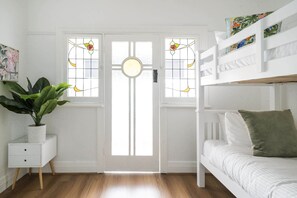 Third bedroom featuring a cosy bunk bed, perfect for children or extra guests, with a comfortable and inviting design.