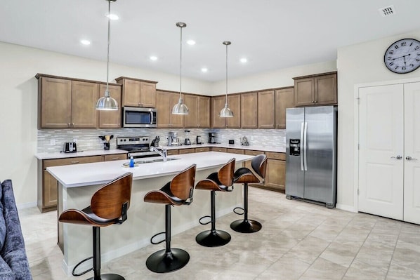 Kitchen with bar seating for casual dining.