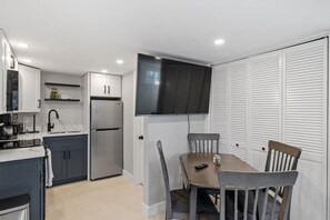 Dining room table with room for 4 guests. 