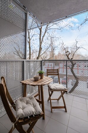 Balcony equipped with garden furniture