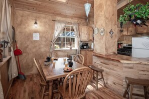 main house kitchen with traditional coffee maker and keurig 