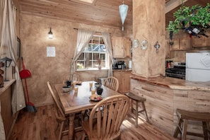 main house kitchen with traditional coffee maker and keurig 