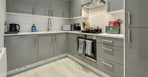 FULLY-EQUIPPED KITCHEN FOR HOME-COOKED MEALS