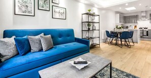 SMART TV AND SOFA BED AVAILABLE IN THE LIVING ROOM