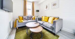 LIVING ROOM WITH SOFA BED