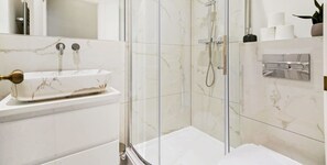 SLEEK MODERN BATHROOM WITH WALK-IN SHOWER