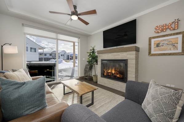 Living room - A newly built apartment, brimming with natural light, accentuating its inherent beauty.