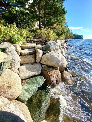 As oceanfront as it gets! High tide will meet you just a few steps down our natural rock embedded staircase.