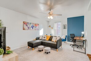 Living Area | Smart TV | Laptop Workspace | Free WiFi | Main Floor