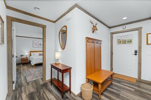 Hang your coat or hat near the cabin door that opens into the living room.