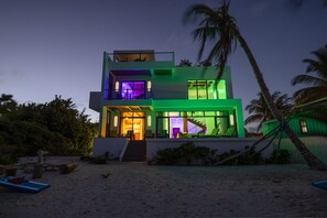 Miami vibes in Belize! Ask us how to download the app the control the LED lights and colors throughout the home