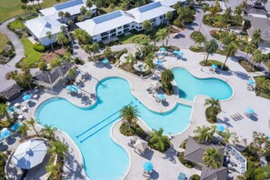 Meandering pools await, ready for leisurely swims and sun-soaked lounging.