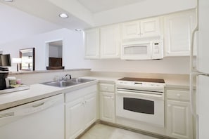 Classic kitchen space with all the modern conveniences for an enjoyable cooking experience.
