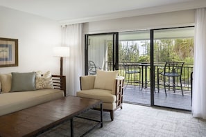 Lounge in comfort with our spacious living room, boasting natural light and stylish furnishings.