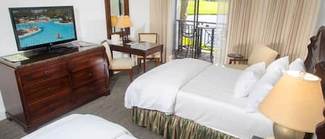 Luxuriate in the classic charm of our inviting bedroom, boasting a serene ambiance for a restful night.