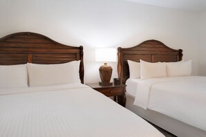 Calm and comforting bedroom with crisp linens and a homely ambiance.