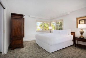 Lavish in comfort with this expansive and pristine white bedroom.