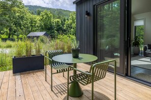 A second deck offers a gorgeous meadow view. 
