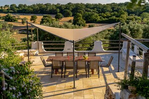 Table, Plant, Furniture, Plant Community, Chair, Building, Tree, Outdoor Furniture, Shade, Outdoor Table