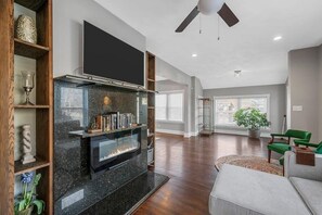 Get cozy by the fire in this custom Electric Fireplace!