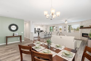Spacious area with dining table and chairs!