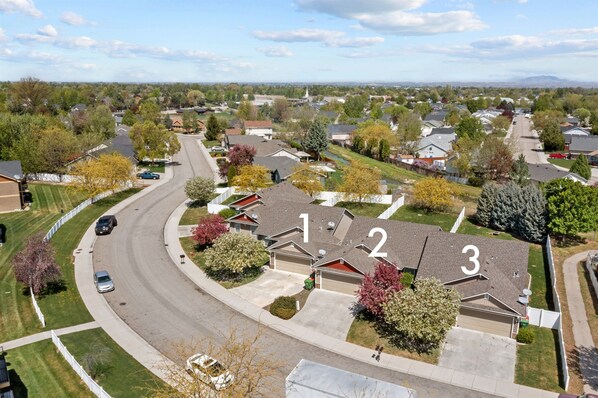 Exterior view of the three adjacent townhomes.