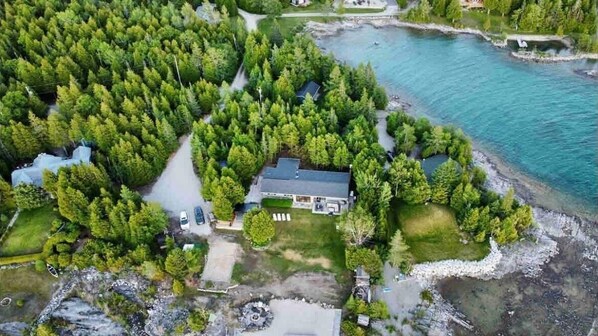 Welcome to The Georgian at the tip of Bruce Peninsula. Enjoy the incredible sunsets, swimming and more from the incredible 2 acre waterfront property. 