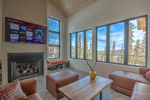 Main living area with gas fireplace and TV