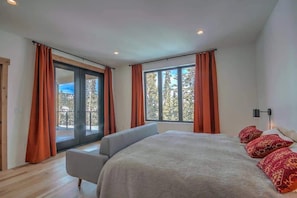 Primary bedroom with deck/hot tub access