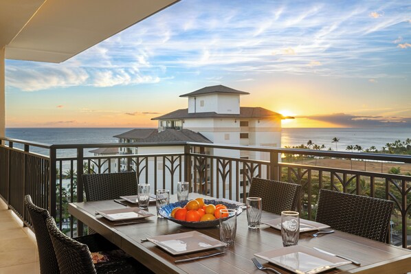 One of two lanai areas with a designer table and breathtaking views.