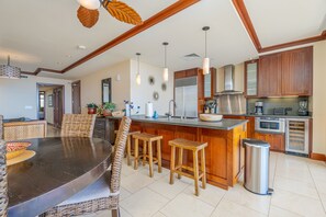 The open floor plan with seating at the breakfast bar.