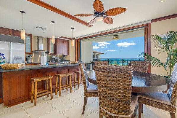 The kitchen with stainless steel appliances and ocean breezes.