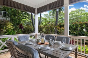 Enjoy meals with panoramic views in this spacious seating at the lanai.