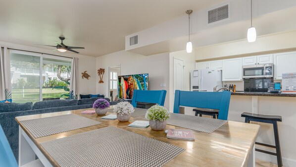 Welcome to the bright sunny kitchen area with breakfast bar seating.