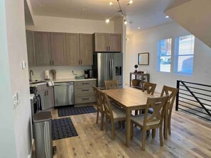 Beautiful open Kitchen Stocked with basic kitchen items and a few extras. 