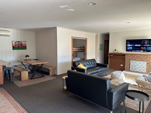 Open plan kitchen, dining and living room.