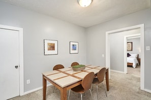 Enjoy a meal or your morning coffee around the table right off the kitchen.