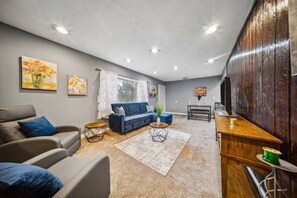 Comfort and style come together in the open front room.