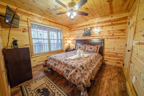 The first of two private bedroom suites with queen bed and Roku-equipped TV.