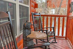 George here is happy to hold your drinks while you relax in the rocking chairs on the covered front porch.