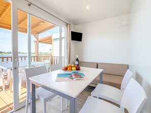 Water, Sky, Property, Swimming Pool, Azure, Cloud, Seaside Resort, Outdoor Furniture, Plant, Tree