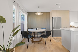 Dining area has seating for 4.