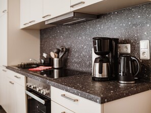 Ferienwohnung 3 - Wohnzimmer mit offener Küche