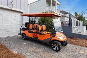 FREE 6 seater golf cart included with your stay at Serenity Now Beach House!