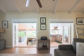 Double doors from the living room to the outdoor area