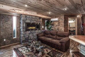 Large linear fireplace in the living room. 