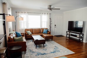 Comfortable living room with 65" Roku TV