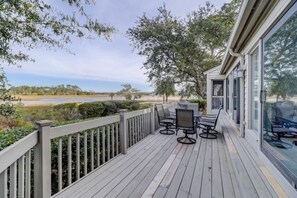 Back deck w/ seating for 6, gas grill and access to LR, Mstr Bedrm, & Porch 