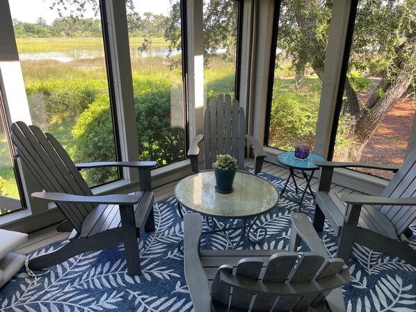 Screened in porch w/ privacy. Access from LR, Kitchen & Deck overlooking back