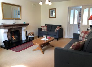 Aughrim Holiday Village, Aughrim, County Wicklow. Open fire, carpet, modern furniture. 